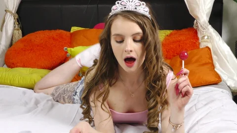 Nubiles.net: Baby Kxtten Never Denies The Big Rainbow Dildo